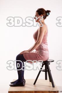 Sitting reference of whole body pink dress purple tights black…